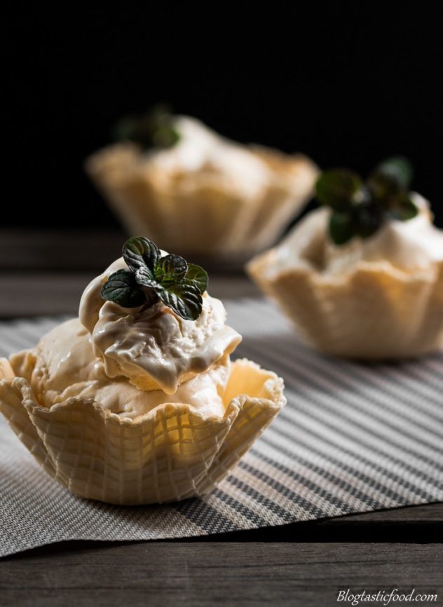 Baileys and Salted caramel ice-cream in waffle cups, garnished with a sprig of chocolate mint.