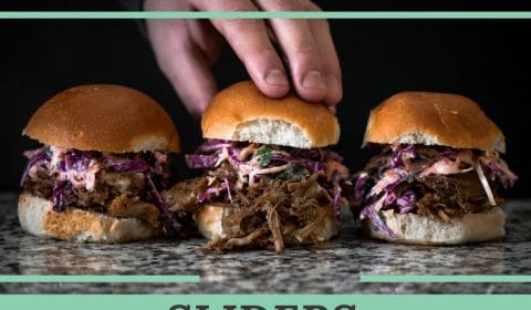 A pulled pork slider with lemon and yogurt coleslaw recipe presented in the form of a pin for Pinterest.