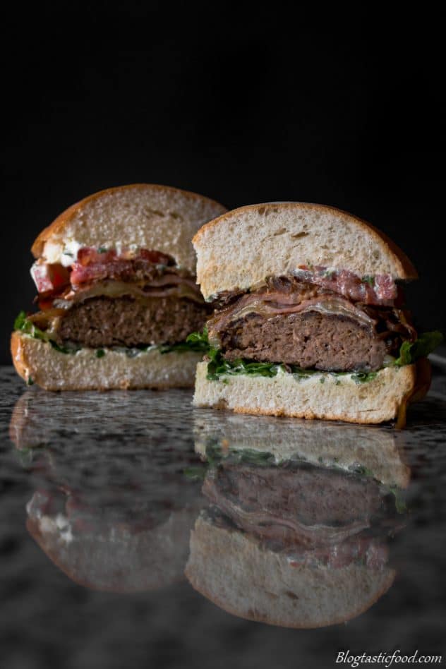 A photo showing the inside of a beef and bacon burger. 