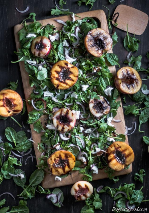 My grilled nectarine and peach salad with rocket, spinach, goats cheese, red onion, balsamic glaze and pecans.