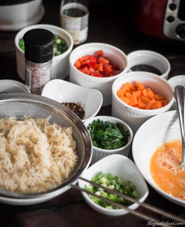 A group of ingredients that are nicely prepared for a fried rice recipe.