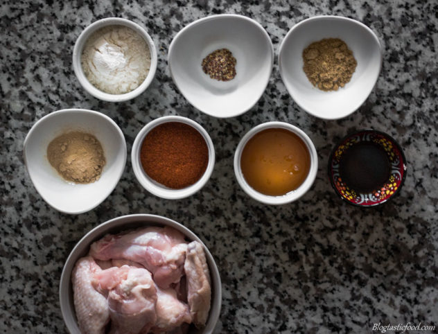 An overhead photo of all the ingredients for the honey soy mustard chicken wings. 