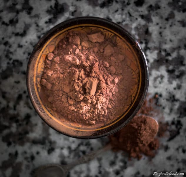 An overhead photo of cocoa powder in a mini bowl.