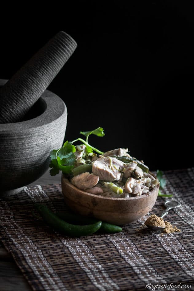 Thai chicken green curry served on a small bowl.