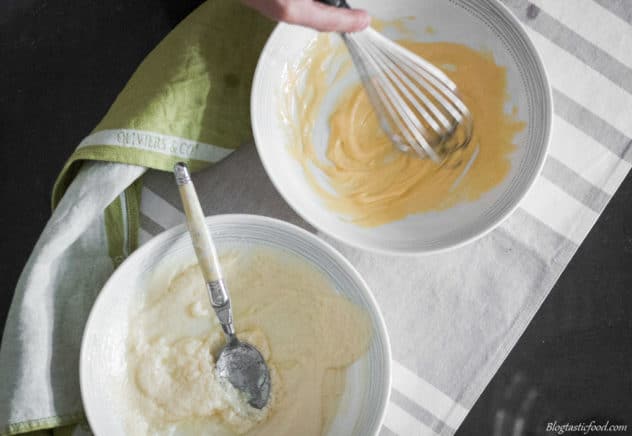 A photo of split mayo being whisked through an egg yolk.