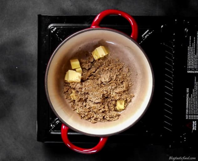 A photo of brown sugar and butter in a pot.