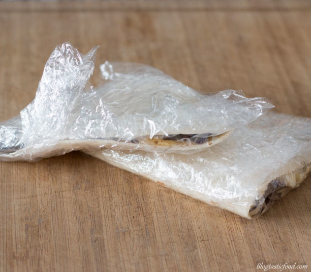 A photo of un-toasted quesadillas wrapped in cling film.