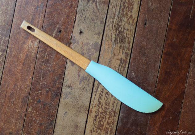 A photo of a blue silicon spatula.