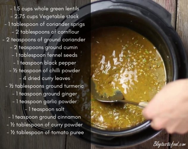 A photo of all of the raw slow cooker lentil curry ingredients in a slow cooker.